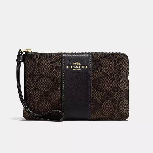 Wristlet Brown Signature Coach canvas