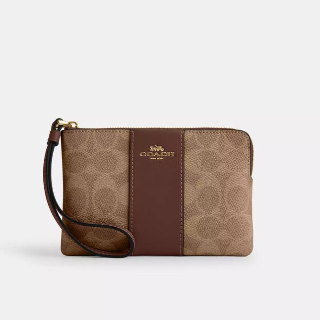 Wristlet Tan brown Signature Coach canvas