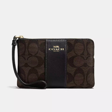 Wristlet Brown Signature Coach canvas